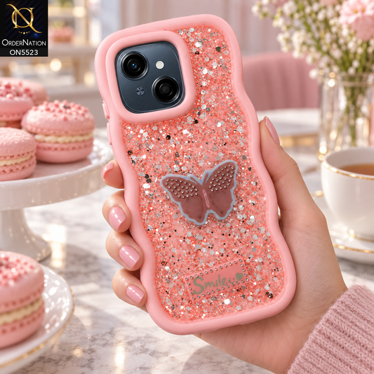 Tecno Spark Go 1 Cover - Pink - New Premium Smile Glitter Soft Case on the phone, held in a hand in a pastel bakery cafe (AI lifestyle render)