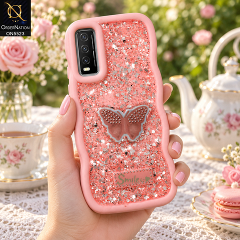 Vivo Y20 Cover - Pink - New Premium Smile Glitter Soft Case on the phone, held in a hand at a garden tea party (AI lifestyle render)