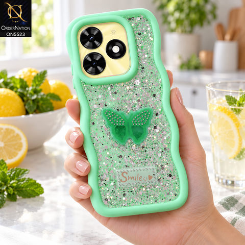 Tecno Pop 8 Cover - Sea Green - New Premium Smile Glitter Soft Case on the phone, held in a hand at a kitchen counter with lemons (AI lifestyle render)