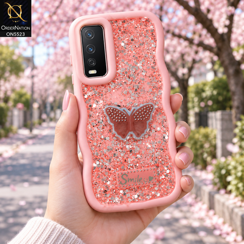 Vivo Y12a Cover - Pink - New Premium Smile Glitter Soft Case on the phone, held in a hand under cherry blossoms (AI lifestyle render)