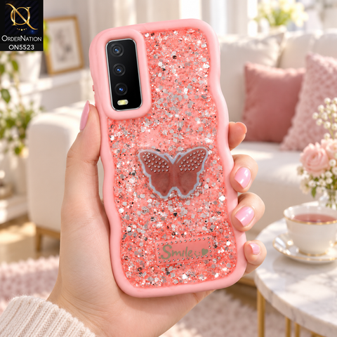 Vivo Y20s Cover - Pink - New Premium Smile Glitter Soft Case on the phone, held in a hand in a bright living room (AI lifestyle render)