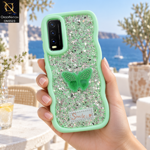 Vivo Y20T Cover - Sea Green - New Premium Smile Glitter Soft Case on the phone, held in a hand on a seaside terrace (AI lifestyle render)