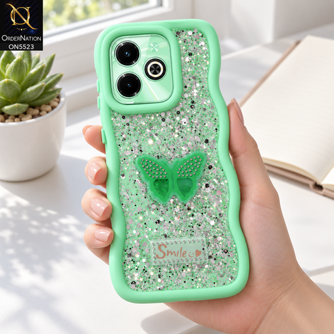 Infinix Hot 40i Cover - Sea Green - New Premium Smile Glitter Soft Case on the phone, held in a hand at a white desk (AI lifestyle render)