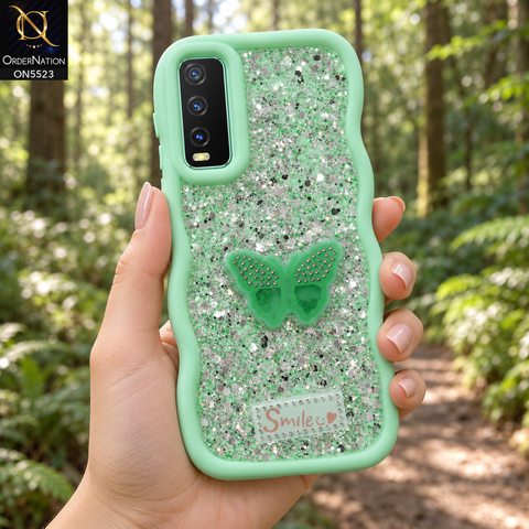 Vivo Y20a Cover - Sea Green - New Premium Smile Glitter Soft Case on the phone, held in a hand on a forest trail (AI lifestyle render)