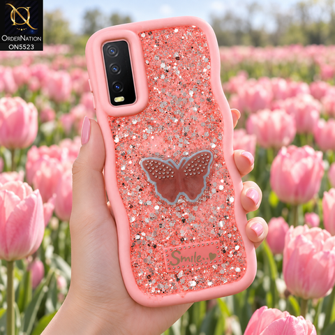 Vivo Y20a Cover - Pink - New Premium Smile Glitter Soft Case on the phone, held in a hand in a tulip field (AI lifestyle render)